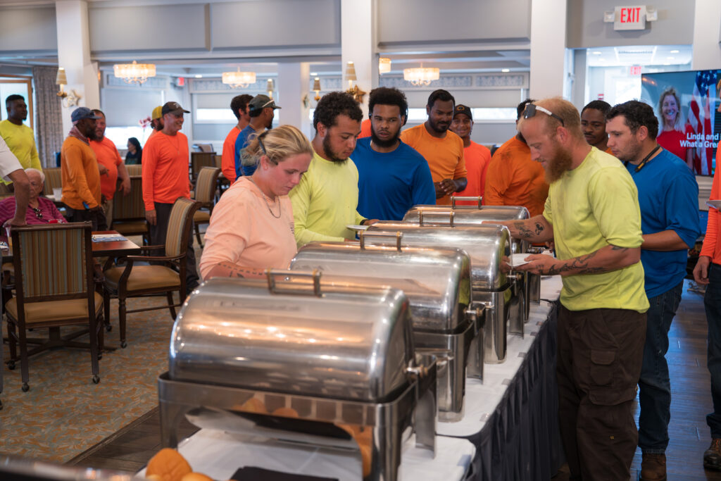 Employees filling plates